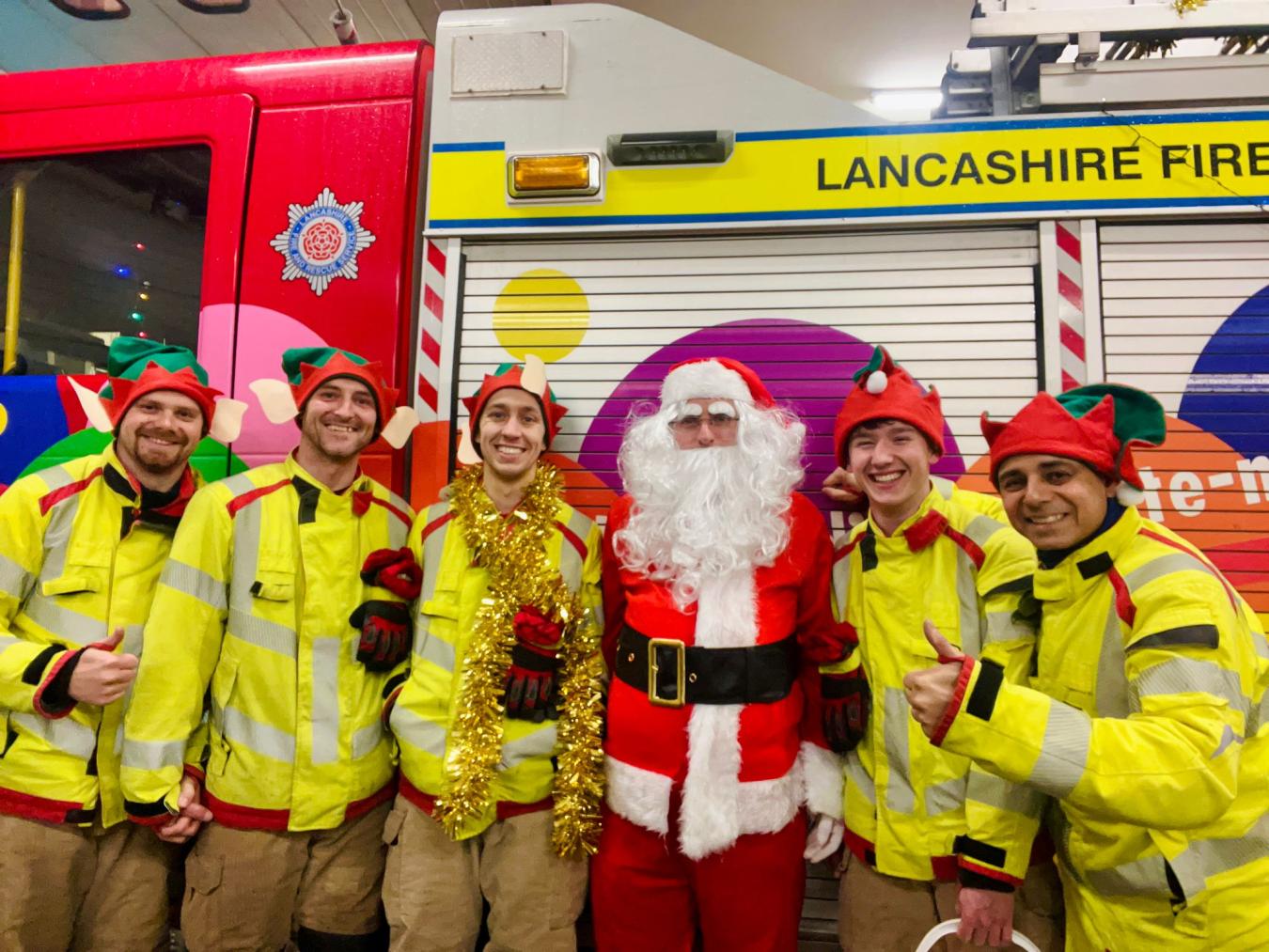 Firefighters with Santa